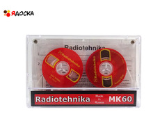 Аудиокассета "Radiotehnika" с катушками красного цвета и логотипом "Novodel Shop"