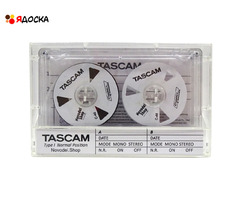 Аудиокассета "TASCAM" с логотипом "Novodel Shop"