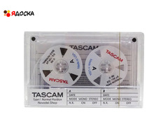 Аудиокассета "TASCAM" с катушками белого цвета