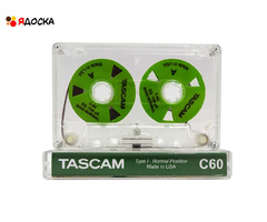 Аудиокассета "TASCAM" с катушками зелёного цвета