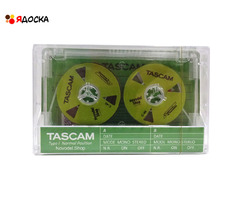 Аудиокассета "TASCAM" с катушками цвета зелёный металлик