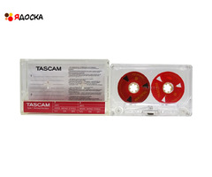 Аудиокассета "TASCAM" с катушками красного цвета с жёлтым текстом